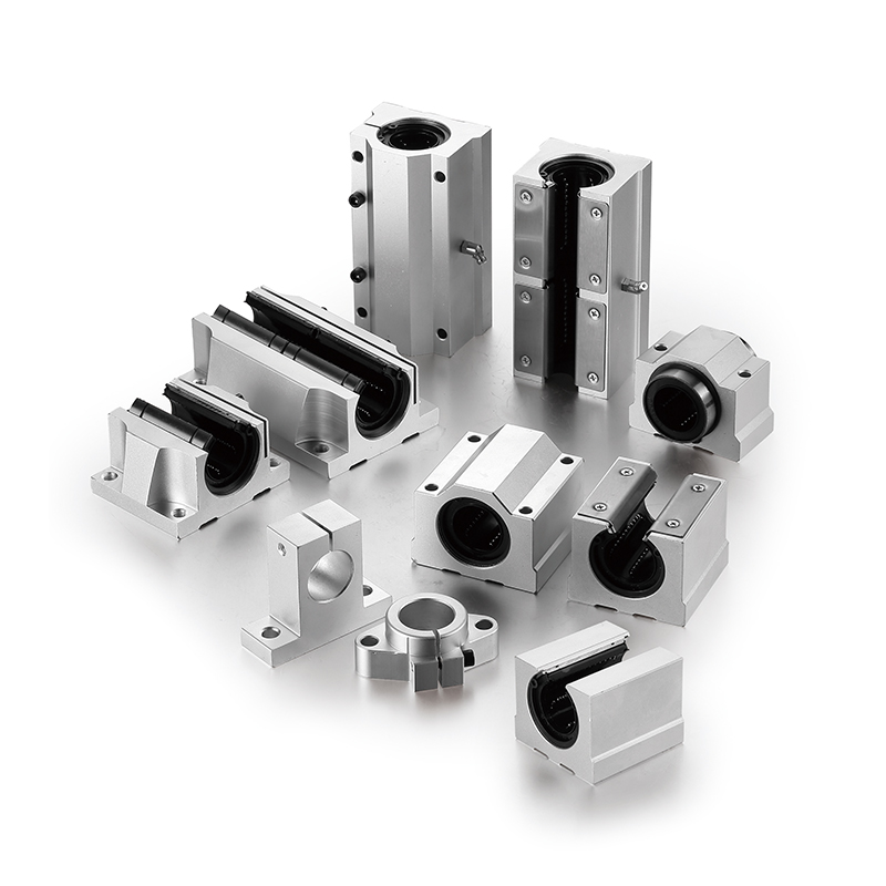 Range of linear bearing housings including open, closed, flanged and pillow block styles for shaft guide systems and precision motion applications.