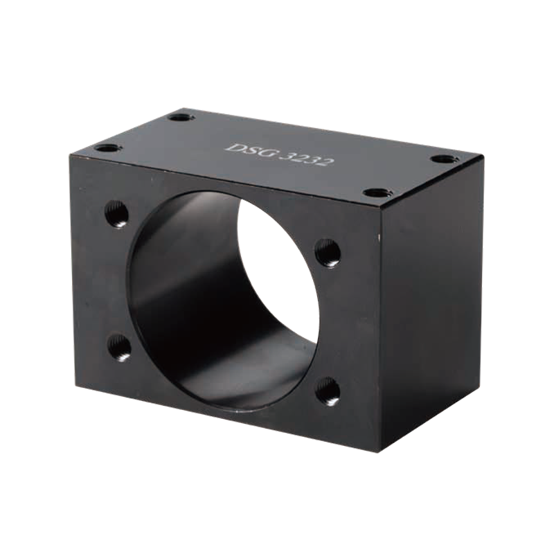 DSG 3232 steel ball screw nut housing with central bore and threaded mounting holes, designed for rigid ball screw nut support in CNC machinery and linear motion systems.