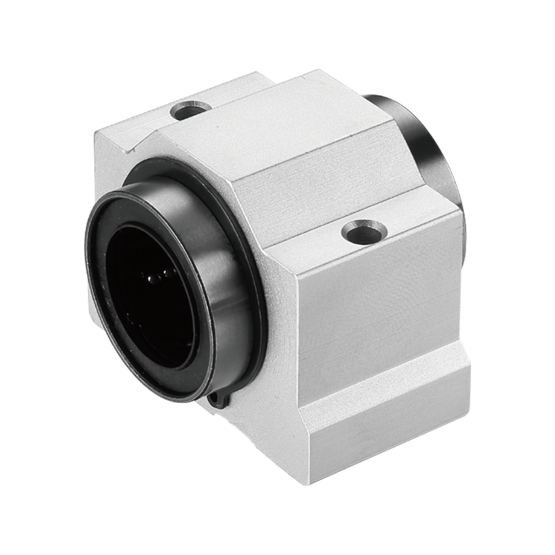 Linear bearing slide unit for round shafts, featuring an ultra short housing and sealed ball bearing for smooth low-friction movement.